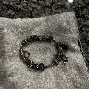 Pandora bracelet with 14 charms